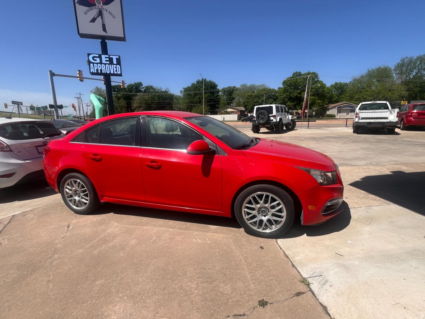 2016 RED CHEVROLET CRUZE LIMITED 2LT 2LT Manual (1G1PF5SB7G7) with an 1.4L L4 DOHC 16V TURBO engine, 6-Speed Manual transmission, located at 8101 E. Skelly Dr., Tulsa, OK, 74129, (918) 592-3593, 36.121891, -95.888802 - Photo#1